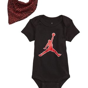 This Jordan Nike Infant Bib Set set includes a bodysuit, bib and booties